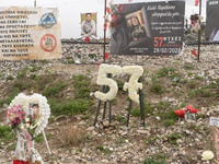 Flowers are forming the number 57, representing the number of individuals who died in the accident, in Tempi Thessaly, Greece, on on Februar...