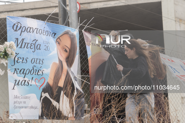 Relatives are carrying wreaths of flowers at the site of the tragic train crash, in Tempi Thessaly, Greece, on on February 28, 2024. 