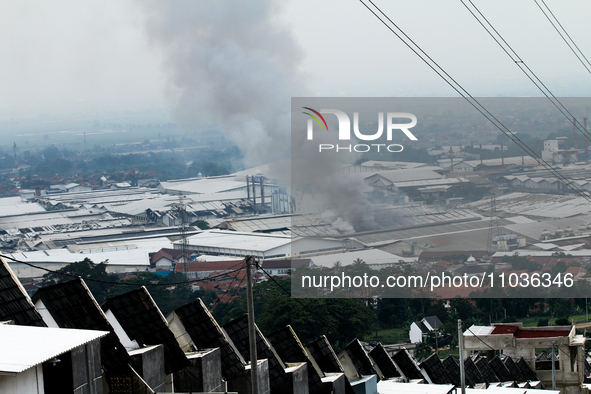 A fire is happening at the Kahatex Factory complex in Sumedang Regency, Indonesia, on February 29, 2024. Authorities are currently investiga...