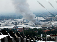 A fire is happening at the Kahatex Factory complex in Sumedang Regency, Indonesia, on February 29, 2024. Authorities are currently investiga...