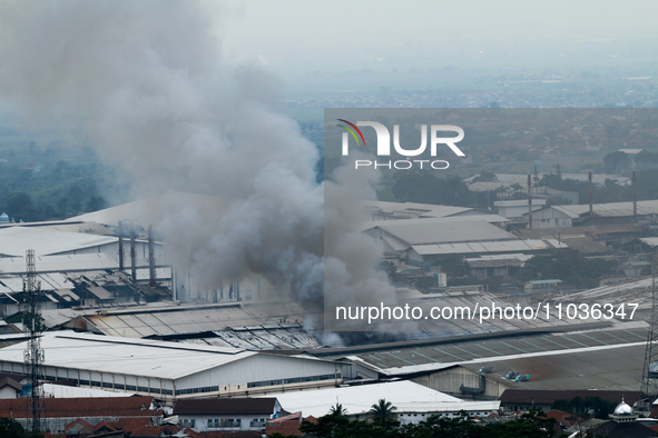 A fire is happening at the Kahatex Factory complex in Sumedang Regency, Indonesia, on February 29, 2024. Authorities are currently investiga...