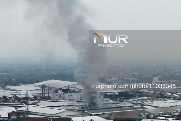 A fire is happening at the Kahatex Factory complex in Sumedang Regency, Indonesia, on February 29, 2024. Authorities are currently investiga...