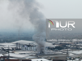 A fire is happening at the Kahatex Factory complex in Sumedang Regency, Indonesia, on February 29, 2024. Authorities are currently investiga...