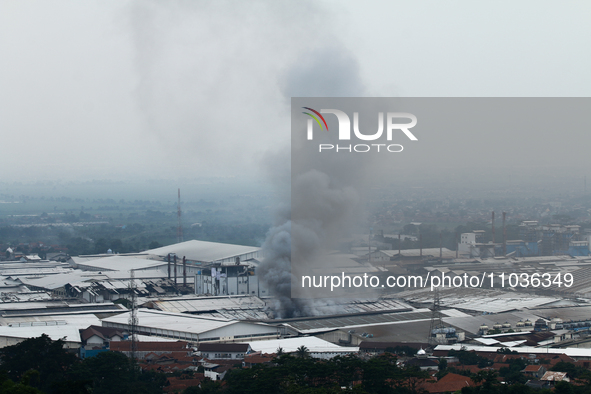 A fire is happening at the Kahatex Factory complex in Sumedang Regency, Indonesia, on February 29, 2024. Authorities are currently investiga...