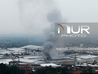 A fire is happening at the Kahatex Factory complex in Sumedang Regency, Indonesia, on February 29, 2024. Authorities are currently investiga...