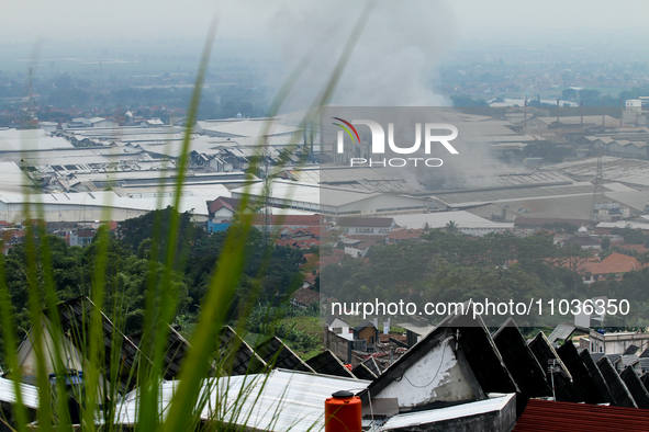 A fire is happening at the Kahatex Factory complex in Sumedang Regency, Indonesia, on February 29, 2024. Authorities are currently investiga...