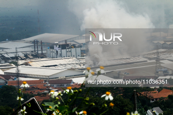 A fire is happening at the Kahatex Factory complex in Sumedang Regency, Indonesia, on February 29, 2024. Authorities are currently investiga...