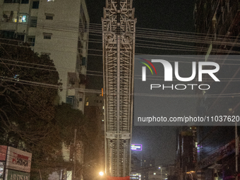 Firefighters are rescuing people from the roof after a fire broke out in a multi-storey building in Dhaka, Bangladesh, on February 29, 2024....