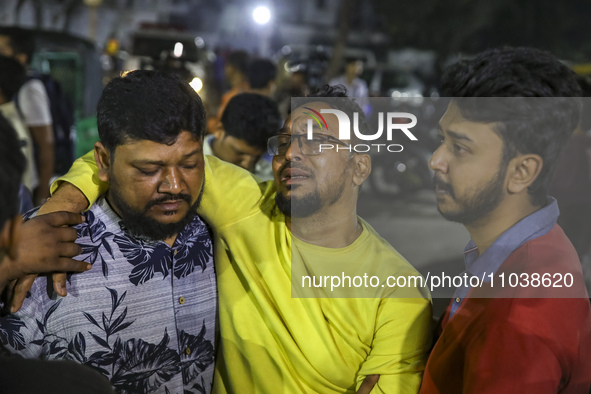 Relatives of victims are searching for their loved ones following a fire that broke out in a multi-story building in Dhaka, Bangladesh, on F...