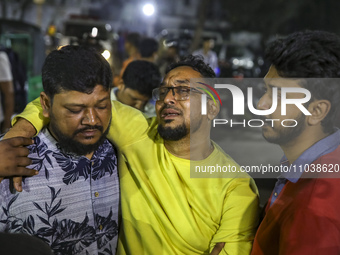 Relatives of victims are searching for their loved ones following a fire that broke out in a multi-story building in Dhaka, Bangladesh, on F...