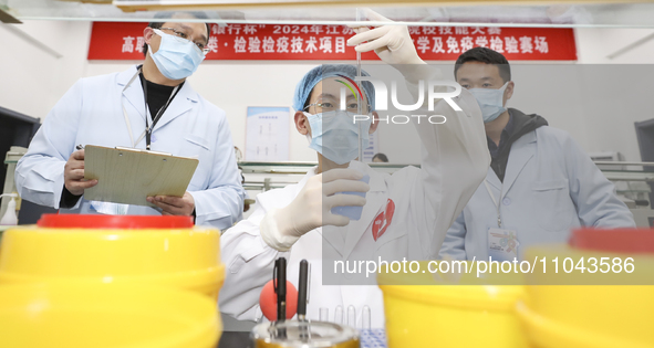 College students are participating in a basic clinical examination competition in Huai'an, Jiangsu Province, China, on March 2, 2024. 