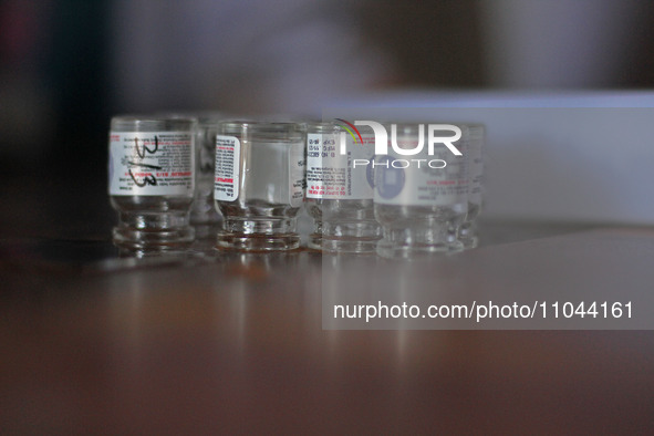 Empty vials of polio vaccine are being seen at a health center in Srinagar, Kashmir, India, on March 3, 2024. A three-day pulse polio vaccin...