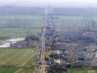 Workers are carrying out railway pier and column construction at the Fanji town section of the Nanjing-Huai'an Intercity Railway under const...