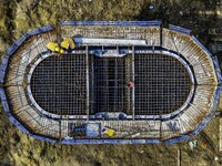 Workers are carrying out railway pier and column construction at the Fanji town section of the Nanjing-Huai'an Intercity Railway under const...