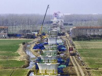 Workers are carrying out railway pier and column construction at the Fanji town section of the Nanjing-Huai'an Intercity Railway under const...