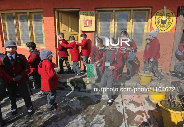 School children are arriving on the first day in Srinagar, Kashmir, on March 4, 2024. Schools across Kashmir are reopening after a three-mon...