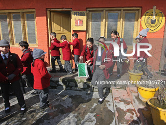 School children are arriving on the first day in Srinagar, Kashmir, on March 4, 2024. Schools across Kashmir are reopening after a three-mon...