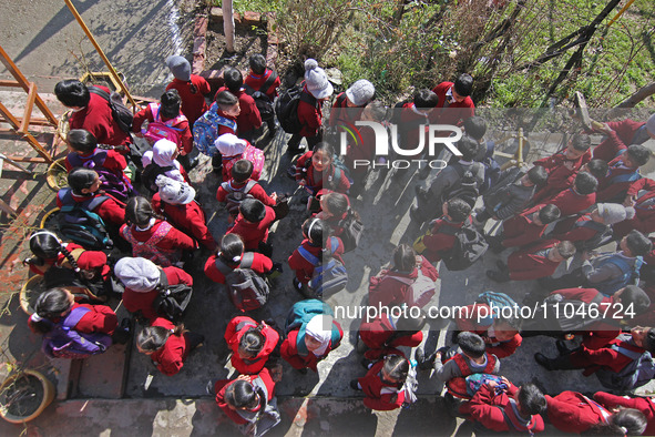 School children are attending morning prayers on the first day in Srinagar, Kashmir, on March 4, 2024. Schools across Kashmir are reopening...