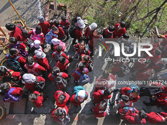 School children are attending morning prayers on the first day in Srinagar, Kashmir, on March 4, 2024. Schools across Kashmir are reopening...