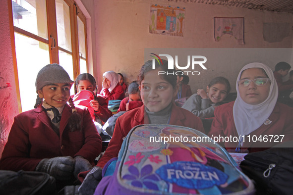 School girls are sitting in the classroom on the first day in Srinagar, Kashmir, on March 4, 2024. Schools across Kashmir are reopening afte...