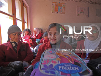 School girls are sitting in the classroom on the first day in Srinagar, Kashmir, on March 4, 2024. Schools across Kashmir are reopening afte...