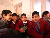 School boys are pictured on the first day of school in Srinagar, Kashmir, on March 4, 2024. Schools across Kashmir are reopening after a thr...