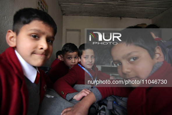 School boys are pictured on the first day of school in Srinagar, India, on March 4, 2024. Schools across Kashmir are reopening after a three...