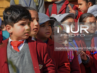 School children are attending morning prayers on the first day in Srinagar, Kashmir, on March 4, 2024. Schools across Kashmir are reopening...