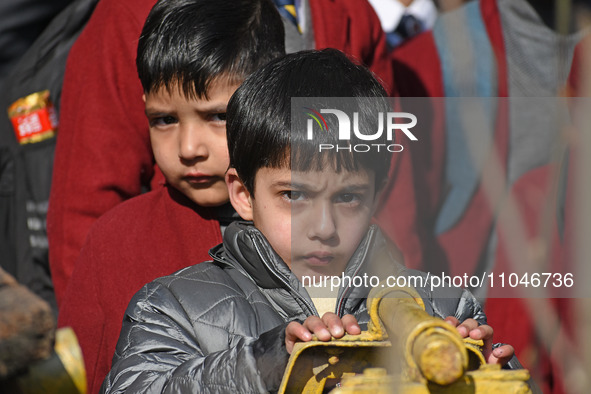 A school boy is pictured on the first day of school in Srinagar, Kashmir, on March 4, 2024. Schools across Kashmir are reopening after a thr...