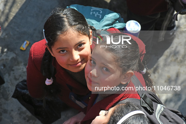 School children are arriving on the first day in Srinagar, Kashmir, on March 4, 2024. Schools across Kashmir are reopening after a three-mon...