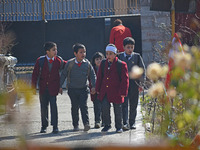 School children are arriving on the first day in Srinagar, Kashmir, on March 4, 2024. Schools across Kashmir are reopening after a three-mon...