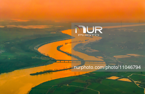 The Huaihongxin River is winding through Shuanggou town in Suqian, China, at sunset on March 3, 2024. 