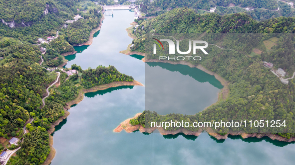 An aerial photo is showing the water diversion project of Chebahe Reservoir in Enshi, Hubei Province, Central China, on May 11, 2023. In 202...