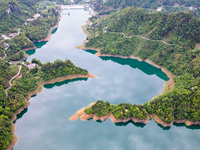 An aerial photo is showing the water diversion project of Chebahe Reservoir in Enshi, Hubei Province, Central China, on May 11, 2023. In 202...