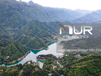 An aerial photo is showing the water diversion project of Chebahe Reservoir in Enshi, Hubei Province, Central China, on May 11, 2023. In 202...