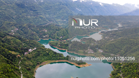 An aerial photo is showing the water diversion project of Chebahe Reservoir in Enshi, Hubei Province, Central China, on May 11, 2023. In 202...