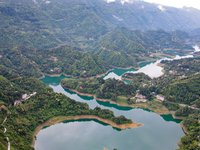 An aerial photo is showing the water diversion project of Chebahe Reservoir in Enshi, Hubei Province, Central China, on May 11, 2023. In 202...