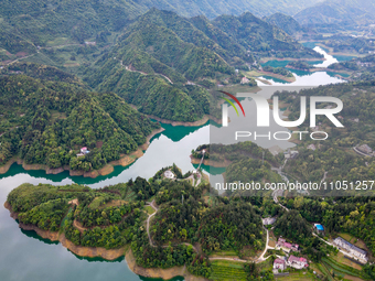 An aerial photo is showing the water diversion project of Chebahe Reservoir in Enshi, Hubei Province, Central China, on May 11, 2023. In 202...