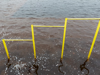 A horizontal bar is submerged in the area of Natalka Park in Kyiv, Ukraine, on March 6, 2024, due to increased water discharges from the Kyi...