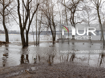 In Kyiv, Ukraine, on March 6, 2024, the area in Natalka Park is flooding due to increased water discharges from the Kyiv Reservoir, followin...