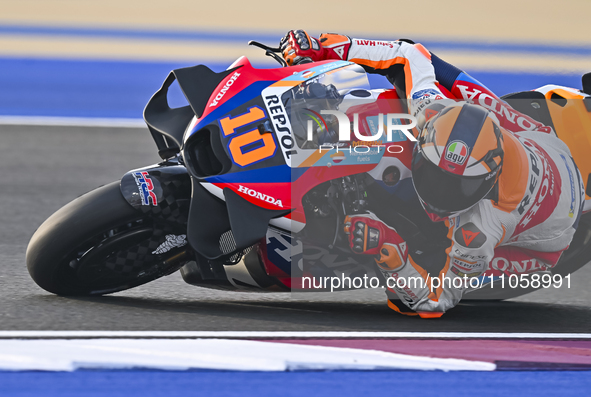 Italian MotoGP rider Luca Marini of the Repsol Honda Team is in action during the Free Practice 1 session of the Qatar Airways Motorcycle Gr...