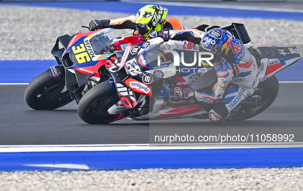 Spanish MotoGP rider Joan Mir of the Repsol Honda Team is in action during the Free Practice 1 session of the Qatar Airways Motorcycle Grand...