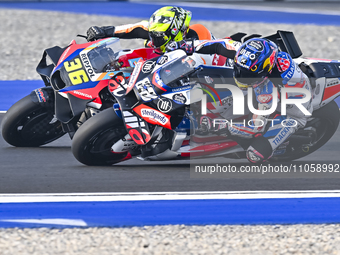 Spanish MotoGP rider Joan Mir of the Repsol Honda Team is in action during the Free Practice 1 session of the Qatar Airways Motorcycle Grand...