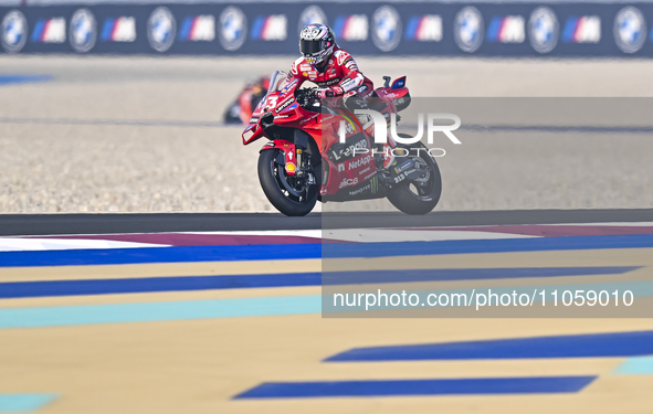 Italian MotoGP rider Enea Bastianini of the Ducati Lenovo Team is in action during the Free Practice 1 session of the Qatar Airways Motorcyc...