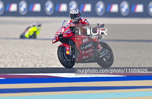 Italian MotoGP rider Enea Bastianini of the Ducati Lenovo Team is in action during the Free Practice 1 session of the Qatar Airways Motorcyc...