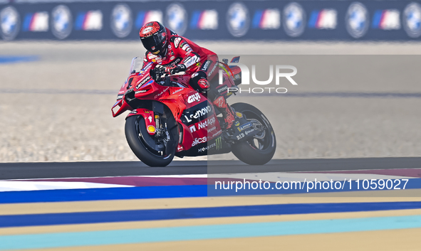 Italian MotoGP rider Francesco Bagnaia of the Ducati Lenovo Team is in action during the Free Practice 1 session of the Qatar Airways Motorc...