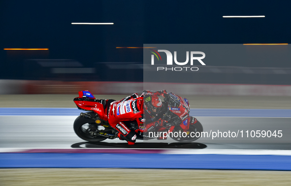 Italian MotoGP rider Francesco Bagnaia of the Ducati Lenovo Team is in action during the Free Practice 1 session of the Qatar Airways Motorc...