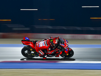 Italian MotoGP rider Francesco Bagnaia of the Ducati Lenovo Team is in action during the Free Practice 1 session of the Qatar Airways Motorc...