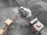 Workers are preparing materials for tunnel reinforcement at the exit of the Tiemengguan tunnel in Bazhou, Xinjiang province, China, on March...