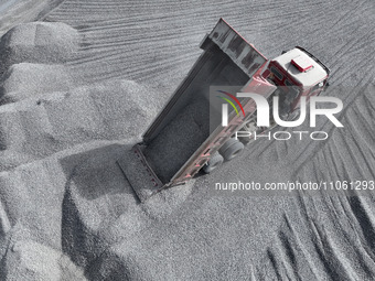 Workers are preparing materials for tunnel reinforcement at the exit of the Tiemengguan tunnel in Bazhou, Xinjiang province, China, on March...